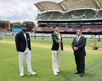 Kohli and Paine during toss