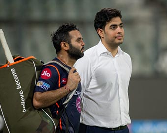 Parthiv with Akash Ambani (file photo)