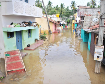 Nanjangud: Water released from Kabini dam over Kapila river, inundates Nanjangud, in Karnataka.