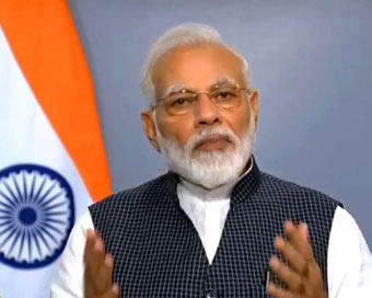  963325
Caption: New Delhi: Prime Minister Narendra Modi addresses the nation on All India Radio, after the government altered the special status of Jammu and Kashmir. (Photo: IANS)