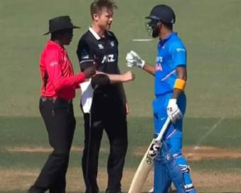 Jimmy Neesham and KL Rahul bump fists