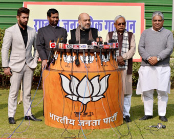 New Delhi: BJP Chief Amit Shah accompanied by Lok Janshakti Party (LJP) chief Ram Vilas Paswan, his son Chirag Paswan, Bihar Chief Minister and JD-U chief Nitish Kumar and BJP leader Bhupender Yadav, addresses a joint press conference at his residenc