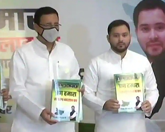 Grand Alliance releases Bihar poll manifesto, pledges change