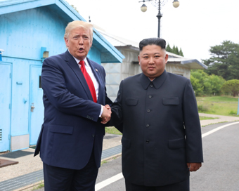 Trump briefly steps into N.Korea, meets Kim 