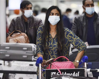 Bengaluru: People wear masks at Bengaluru City Railway Station as a precautionary measure against Coronavirus, in Bengaluru on March 11, 2020. (Photo: IANS)